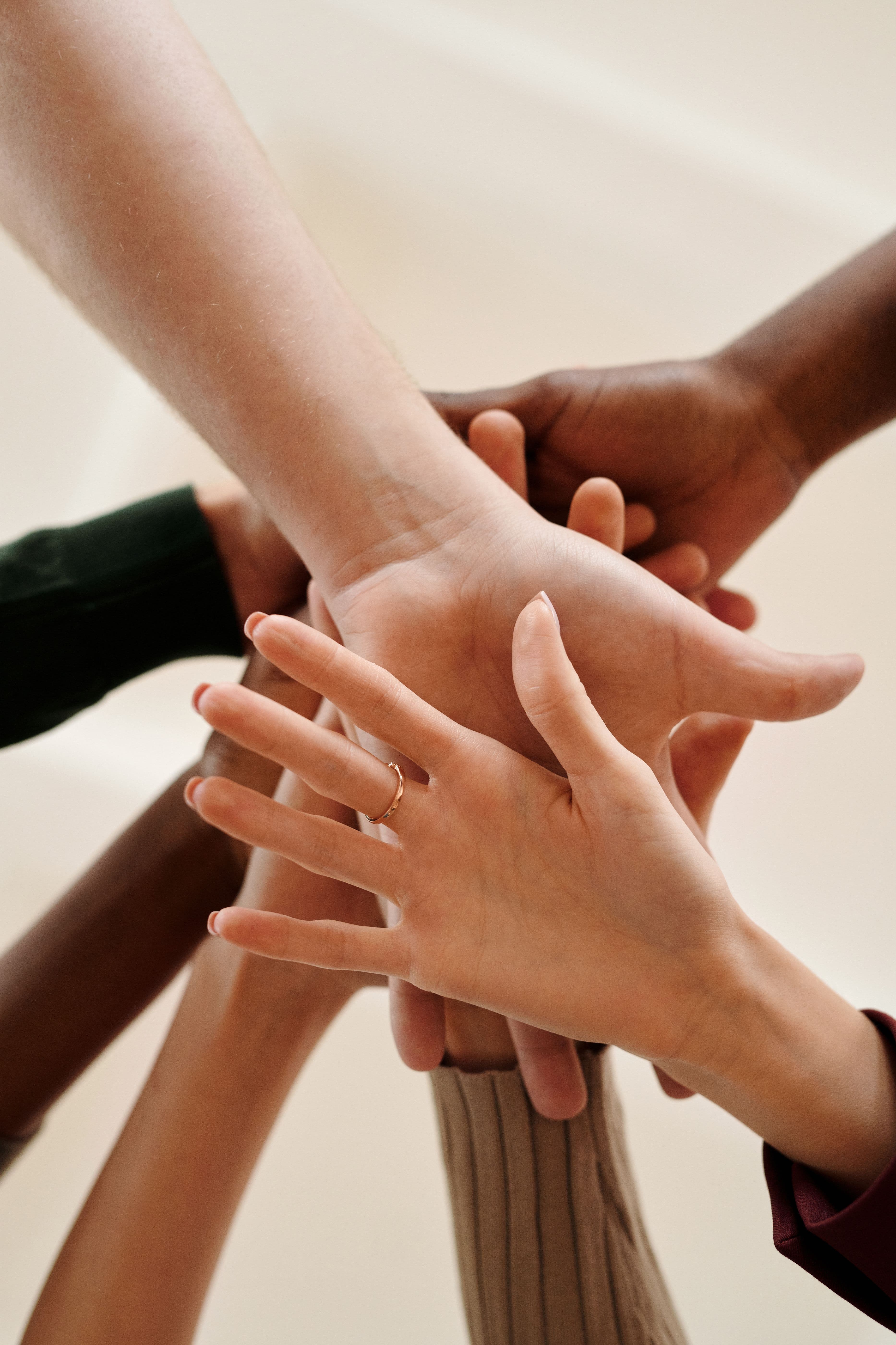 Hands joined together, representing business partnerships